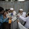 <p>Nazirullah  a resident  shows the media a newspaper that had published a picture of Faisal Shahzad  a Pakistani American held in New York on suspicion of driving a bomb laden car into Times Square  outside the ancestral home of Shahzad  family in Mohib Banda  in Pakistan  north western Khyber Pakhtoonkhwa province  May 5  2010  Shahzad has admitted to trying to detonate the bomb in a sports utility vehicle and receiving explosives making training in a known Taliban and al Qaeda stronghold in Pakistan  U S prosecutors say  REUTERS Faisal Mahmood < p>