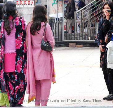 each other and having fun  Girls are wearing shalwar kameez of lovely prints and are busy in shopping  Girls love to buy handmade shawls and other handicraft  sell in the shops of mall road