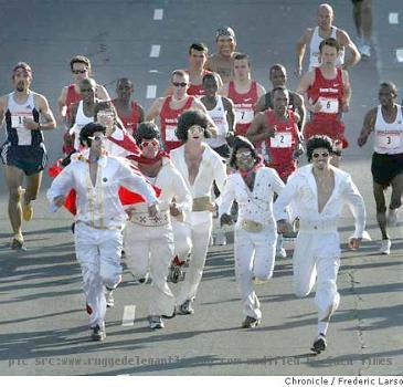 a likes  Jesus  who turned out to be part of a mock World Wrestling Federation  the Organs  R  Us  ORU  Centipede  and a Jews for Jesus troupe handing out flyers at the end of the race  S F  Chronicle Photographer  Frederic Larson  Shows Off the Elvis Show Offs The most inspiring of all  other than the elite racers at the front of the pack  were the seniors we saw power