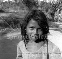 633   Hurricane Mitch survivor carrying fishes  Nicaragua