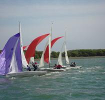 Eighteen RS K6s descended on Itchenor Sailing Club over the weekend of 9th  10th May for its Open Meeting  Visitors came from as far afield as Devon  Cornwall  Suffolk and Essex to make this