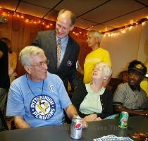 <p>Mark Critz  top  Democratic hopeful for the Congressional seat vacated by the death of long time congressman John Murtha  talks with Bill Lohr  left  and his wife Diana Lohr as he campaigns at the Union Social Hall in Johnstown  Pa   Friday  May 14  2010  < p>