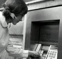 FILE  An unidentified girl puts her computer punch card into the slot of an ATM money machine  outside a bank in central London  in this file photo dated Jan  19  1968  The first automatic teller machine was installed in London in 1967  with John Shepherd Barron being credited with inventing the machine  It is announced Wednesday May 19  2010  that Scotsman John Shepherd Barron died in Scotland on Saturday May 15  2010  after a short illness  aged 84   AP Photo file  2010 05 20 07 22 11  FILE  An unidentified girl puts her computer punch card into the slot of an ATM money machine  outside a bank in central London  in this file photo dated Jan  19  1968  The first automatic teller machine was installed in London in 1967  with John Shepherd Barron being credited with inventing the machine  It is announced Wednesday May 19  2010  that Scotsman John Shepherd Barron died in Scotland on Saturday May 15  2010  after a short illness  aged 84   AP Photo file  2010 05 20 07 22 11