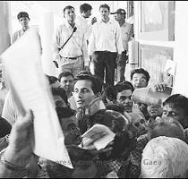 Teachers await marksheets of their students at Diwan Ballubhai Shah Secondary School in Ahmedabad on Thursday