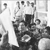 Teachers await marksheets of their students at Diwan Ballubhai Shah Secondary School in Ahmedabad on Thursday