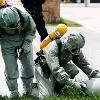 In the first drill  special policemen and armed policemen confronted  terrorists  in the city s square and the  terrorists  triggered the bombs which spread radioactive contaminants  Members of the special police check the site of a  dirty bomb  during an anti terrorism drill in Hohhot  capital of north China s Inner Mongolia Autonomous Region  June 9  2009   Xinhua Zheng