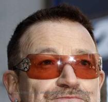 <p>File picture shows U2 lead singer Bono during a ceremony where a portion of West 53rd Street was renamed U2 Way in New York  March 3  2009  Bono has undergone emergency back surgery on May 21  2010 for an injury sustained during tour preparation training  He was admitted to a specialist neuro surgery unit in a Munich hospital  Picture taken March 3  2009  REUTERS Gary Hershorn File < p>