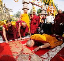 Roger Federer of Switzerland and Refael Nadal of Spain attend a photo event launching the ATP Qatar Exxon Mobile Open at the Souq Waqif in Doha  Qatar  Ian Walton Getty Images Jan  4  2010 The Dalai Lama prostrates at Mahabodhi temple in Bodh Gaya  India  Bodh Gaya is the town where Prince Siddhartha Gautama attained enlightenment after intense meditation and