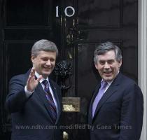 Pass with flying colours  Students of DAV Public School celebrate their success after the announcement of 10th class results of CBSE in Amritsar on Thursday   PTI  For shutterbugs  Canadian Prime Minister Stephen Harper waves before entering 10 Downing Street with British Prime Minister Gordon Brown for their bilateral meeting in London on Thursday   AP