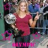 Dancing with the Stars champ   beating out the much beloved actor Gilles Marini   Here is a pic of Shawn at Good Morning America earlier this morning showing off her sparkly new trophy  Shawn Johnson is adding a mirrorball trophy to her collection of Olympic medals  After all  the two glittering prizes seem to go very well together  The 17 year old gymnast was named  Dancing