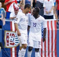 USA s Freddy Adu  right  and Charlie Davies  left  celebrate after Davies scored a goal against Grenada in the second half of a CONCACAF Gold Cup soccer match Saturday  July 4  2009  at Qwest