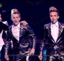 Pineapple head  John and Edward Grimes perform Under Pressure as Calvin Harris storms the stage