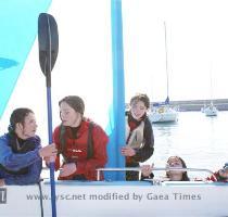 Florence holding on for dear life  Leah and Ella try to decide who should have the paddle