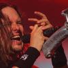 Jonathan Davis   Where else will you find a naked robot statue attached to a mic