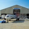 ARINC is celebrating the opening of our newest aircraft facility  The AMOC includes the largest commercial hangar in Oklahoma City  Oklahoma  conveniently located on the grounds of Will Rogers World Airport  The new hangar provides a