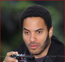 Lenny Kravitz celebrated the 20th anniversary of his debut album Let Love Rule with a very big cake in a London park yesterday  June 24  during a photocall  He in town for his Let Love Rule