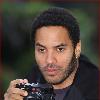 Lenny Kravitz celebrated the 20th anniversary of his debut album Let Love Rule with a very big cake in a London park yesterday  June 24  during a photocall  He in town for his Let Love Rule