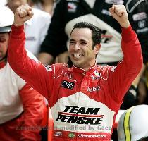 Mark Cowan Icon SMI Helio Castroneves  from Brazil  celebrates winning the 93nd Indy 500 at the Indianapolis Motor Speedway on May 24