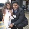 Photo Gallery CBS Sports Analyst and former NFL player  Spencer Tillman  poses with one of our young Honored Guests at a LUA event this year   Photo by Doug Layton