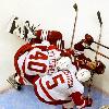 Yahoo s NHL gallery   nor Sportsline s NHL gallery   so if you want the Getty photos  you ll have to deal with watermarks    Emmanuel Lozano The Arizona RepublicHenrik Zetterberg and Nicklas Lidstrom take down Coyotes forward Daniel Carcillo in front of the Wings  net