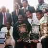 FILE   In this Sept  14  1994 file photo  The Temptations  from left to right  Theo Peoples  Otis Williams  Melvin Franklin  and Ali Ollie Woodson  pose after being given a star on the Hollywood Walk of Fame in the Hollywood area of Los Angeles  Woodson  who led the legendary Motown quintet The Temptations in the 1980s and  0s and restored them to their hit making glory with the song  Treat Her Like A Lady   has died  He was 58  Motown Alumni Association President Billy Wilson says Woodson died Sunday  May 30  2010 in southern California after battling cancer   AP Photo Brennan Linsley  File  2010 06 01 01 39 12  FILE   In this Sept  14  1994 file photo  The Temptations  from left to right  Theo Peoples  Otis Williams  Melvin Franklin  and Ali Ollie Woodson  pose after being given a star on the Hollywood Walk of Fame in the Hollywood area of Los Angeles  Woodson  who led the legendary Motown quintet The Temptations in the 1980s and  0s and restored them to their hit making glory with the song  Treat Her Like A Lady   has died  He was 58  Motown Alumni Association President Billy Wilson says Woodson died Sunday  May 30  2010 in southern California after battling cancer   AP Photo Brennan Linsley  File  2010 06 01 01 39 12