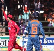 <p>Zimbabwean player Andy Blignaut  left  celebrates the wicket of Indian batsman Dinesh Karthik right  during the match against India  at Harare Sports Club in Harare  Thursday  June 3  2010  Zimbabwe is hosting a triangular series match featuring Sri Lanka and India  < p>