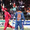 <p>Zimbabwean player Andy Blignaut  left  celebrates the wicket of Indian batsman Dinesh Karthik right  during the match against India  at Harare Sports Club in Harare  Thursday  June 3  2010  Zimbabwe is hosting a triangular series match featuring Sri Lanka and India  < p>