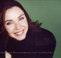 TBH she doesn t look too bad when she s not playing the part  she has some stand up comedy you can see on youtube  her actual name s Stephanie Courtney