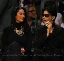 Prince takes in the Lakers vs  Celtics game in Los Angeles yesterday with a very pretty guest  Okay now Prince  photo  SPLASH