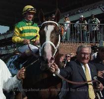 2000 Belmont winner Commendable being led to the winner s circle by his owner Bob Lewis