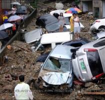 of flooding  landslides     are increasing both in frequency and severity   burying building  cars  humans and everything else in their paths  Bury the cars  before the cars bury YOU  Flooding in Busan  South Korea  July 16  2009  Photo  AFP  Image may be subject to copyright  Torrential rains caused flooding in South Korea triggering landslides  which buried at least a