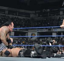 Undertaker Pinning His Opponent Undertaker Pinning The Edge With Signatures Style Of Tombstone Piledriver  This picture was submitted by bhavneet