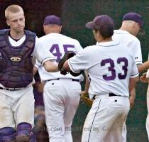 Strasburg pitcher Justin Rush flips the ball to first base  Dennis Grundman Daily Strasburg s Derek Buckley  left  touches gloves with first baseman Riley McDonald  33  after a meeting on the mound in the Rams  loss to Riverheads in the Region B quarterfinals on Wednesday