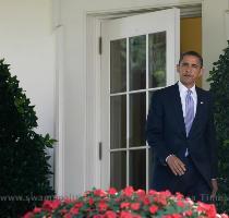 President Barack Obama leaving the Oval Office to address legislation during an appearance in the Rose Garden on June 12  Photo by Saul Loeb   AFP   Getty Images