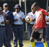 <p>Cameroon s striker  Samuel Eto o controls the ball as South African police officers watch him  during a training session at the Northlands Primary School  northern Durban  South Africa  Saturday  June 12  2010  Cameroon will play the upcoming World Cup soccer tournament in Group E against Japan on Monday June 14 < p>