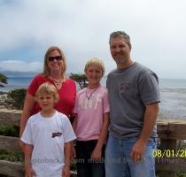 A lady was nice enough to offer take a family picture for us The 17 Mile Drive ended at Pebble Beach Golf Course  Here is the 18th hole  as close as we could get without paying an insane amount of money for green fees