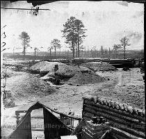 mounted on a specially reinforced railroad car to accommodate its weight of 17 000 pounds  Company G of the 1st Connecticut Heavy Artillery  served the  Dictator  at the siege of Petersburg   Virginia in 1864  The mortar could lob a 200 pound explosive shell about 2 � miles  The  Dictator  was usually positioned in a curved section of the Petersburg