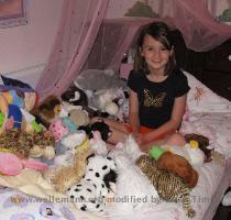 Lauren in the middle of a sea of Webkinz