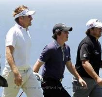 <p>Rory McIlroy  2nd R  of Northern Ireland and his girlfriend Holly Sweeney  L  walk up 11th hole with Ian Poulter  2nd L  of Britain and Graeme McDowell of Northern Ireland during a practice round for the U S  Open Golf Championship in Pebble Beach  California  June 16  2010