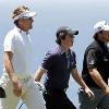 <p>Rory McIlroy  2nd R  of Northern Ireland and his girlfriend Holly Sweeney  L  walk up 11th hole with Ian Poulter  2nd L  of Britain and Graeme McDowell of Northern Ireland during a practice round for the U S  Open Golf Championship in Pebble Beach  California  June 16  2010