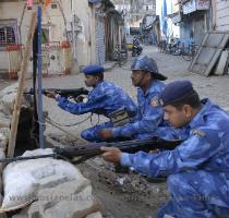 Rapid Action Force personnel take position near the Nariman House at Colaba on Thursday to flush out terrorists holed up at the Chabad house His ordeal was not over  however  The Mumbai