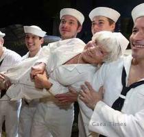 there s nothing like a dame  A 90 year old ex schoolteacher who says she s the woman in one of World War II s most famous photographs   being kissed by a sailor during a 1945 victory celebration in Times Square   was