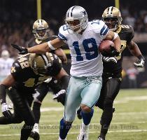 Barber celebrates his first quarter touchdown during the NFL football game against the New Orleans Saints  Saturday  Dec  19  2009  in New Orleans   AP Photo Patrick Semansky  Dallas Cowboys wide receiver Miles Austin  19  pushes New Orleans Saints safety Darren Sharper while running for a touchdown during the first quarter of an NFL football game  Saturday  Dec  19