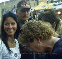 Sturgis Rally News and Backstabbing Report Sturgis Rally Top 10   http   SturgisZone com Oct  26  2002 Sturgis Rally Women with a cold one   Sturgis Motorcycle Rally 2002