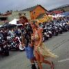 Dec 25   2002 Sturgis SD photos   Grass Skirt Woman in Sturgis SD