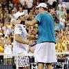 Competing with the physique of his opponent was a particular issue for Roddick  whose Grand Slam season that reached its peak at Wimbledon ended when he was beaten in a fifth set tiebreak  Giant killing  Towering American John Isner is congratulated by Andy Roddick after his defeat The Texan was to perish 7 6  6 3  3 6  5 7  7 6 against the 6ft 9in Isner  whose serve was