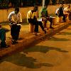 Guinean students study under the lights of the Conakry airport parking lot in June  Though they are dim  the lights are among the few in the electricity starved capital that are sure to be on