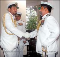 Outgoing Navy Commander Admiral Wasantha Karannagoda greets his successor Vice Admiral Thisara Samarasinghe  Picture by Saman Sri Wedage It came as a surprise