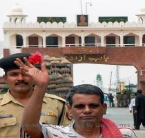 The stepdown  J K Chief Minister Ghulam Nabi Azad addresses the state assembly before submitting his resignation to the Governor at Raj Bhawan in   PTI  Freedom at last  Ram Parkash  51  waves hand  who was released from Kot Lakhpat Jail in Lahore  Pakistan after ten years  at Attari   Wagah border   PTI