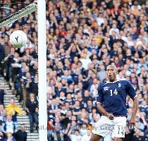 points from three games  Scotland s hopes of booking their place at South Africa in 2010 is already hanging in the balance with a daunting trip to Holland now awaiting them in March  Stunned  Scotland s Chris Iwelumo